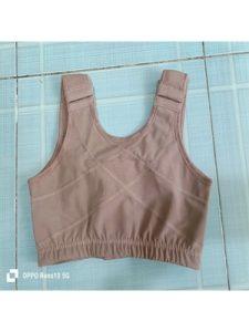 5 Lợi Ích Khi Dùng Áo Định Hình Latex Ann Chery Sau Nâng Ngực – Bí Quyết Phục Hồi Nhanh 3 Áo định hình Latex Ann Chery màu nâu, thiết kế ôm sát, dạng áo bra hỗ trợ phục hồi sau nâng ngực.